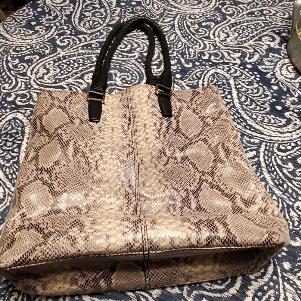 Snake skin leather tote with. Black leather braide